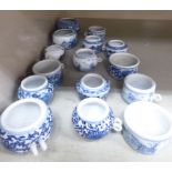 Fifteen similar 20thC Chinese porcelain bird feeders OS2