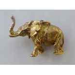A 9ct gold elephant pendant 11