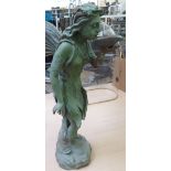 A patinated cast iron garden statue,