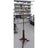 A late 19thC Continental polescreen stand,