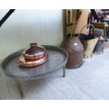 'Antique' domestic metalware: to include two dissimilar coachmans' copper hot water lap warmers;