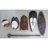 Tribal collectables: to include a shield; a throwing club; three masks;