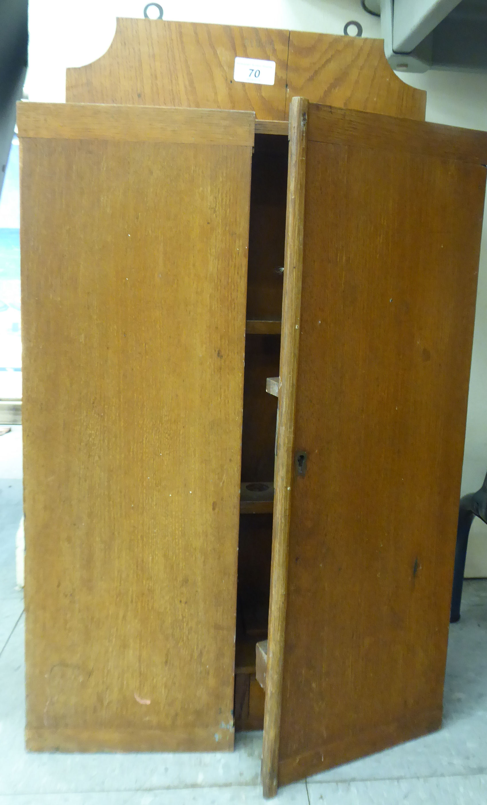 An Edwardian oak smoker's cabinet with two doors, enclosing a fitted interior, - Image 2 of 2