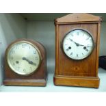 An early 20thC light oak and satinwood inlaid cased mantel clock with straight sides;