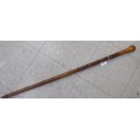 An early 20thC bamboo walking cane with a knop terminal,