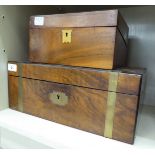 A late Victorian brass bound walnut box with straight sides and an angled, hinged lid 6.5''h 15.