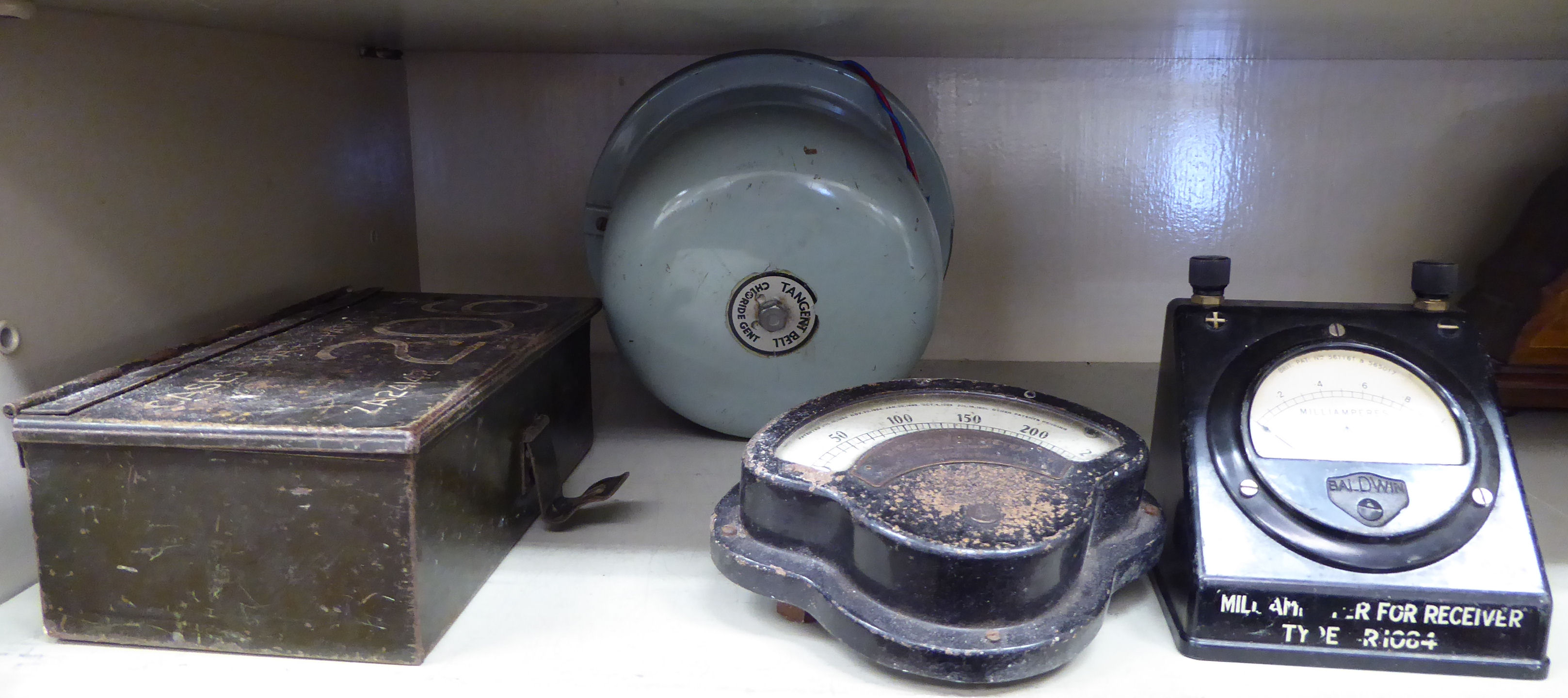 Tangent Bell A mixed lot: to include a Chloride Gent Tangent Bell; and a military ...