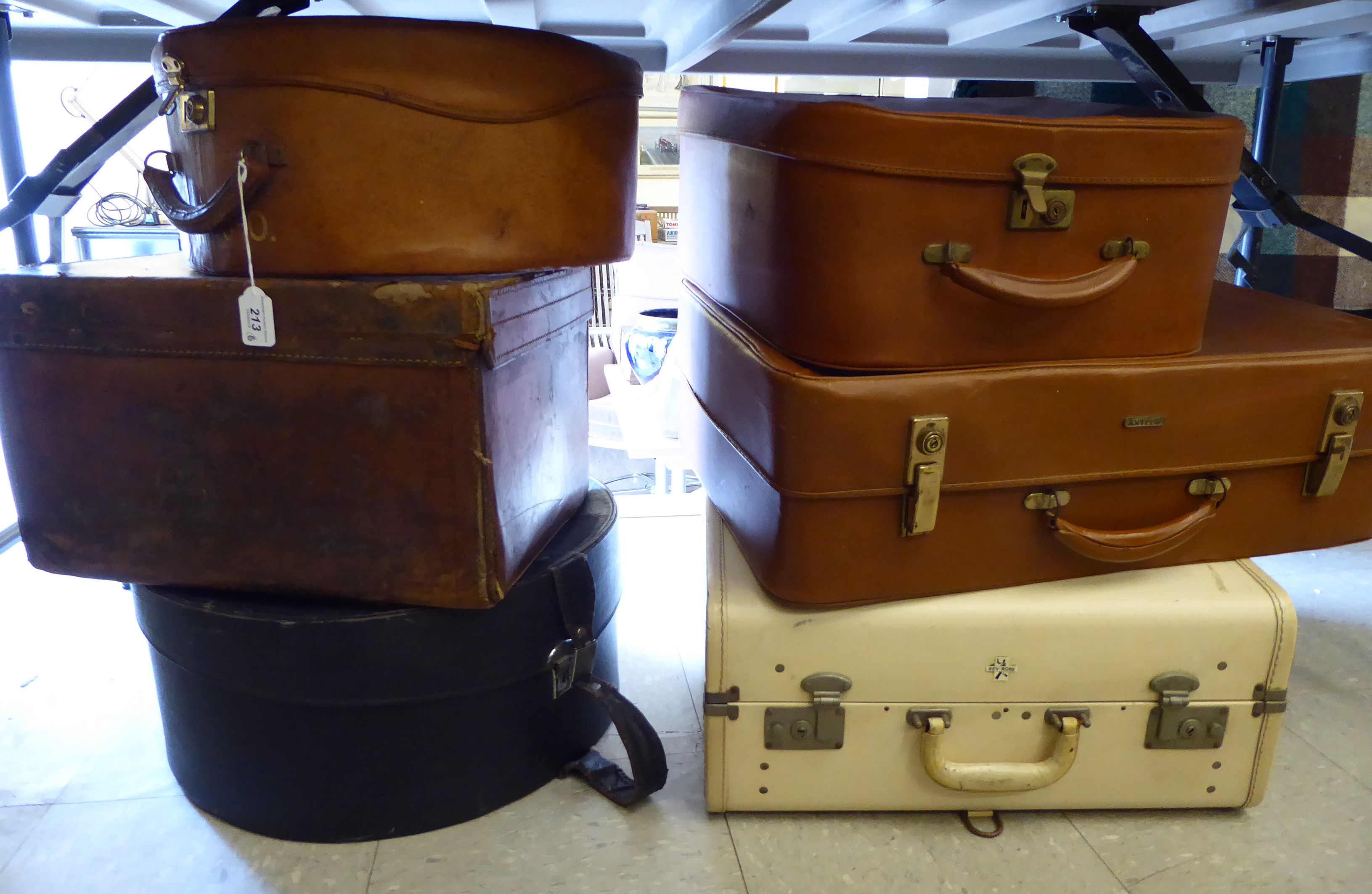 Six items of 'vintage' luggage: to include a pigskin hat box;