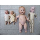 Two Armand Marseille's painted bisque head dolls with sleepy eyes, one on jointed,