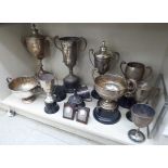 Silver plated pedestal trophy cups and bowls,