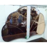 An Art Deco shell design mirror,