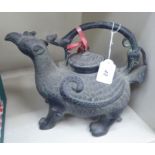 An early 20thC Oriental cast metal novelty teapot,