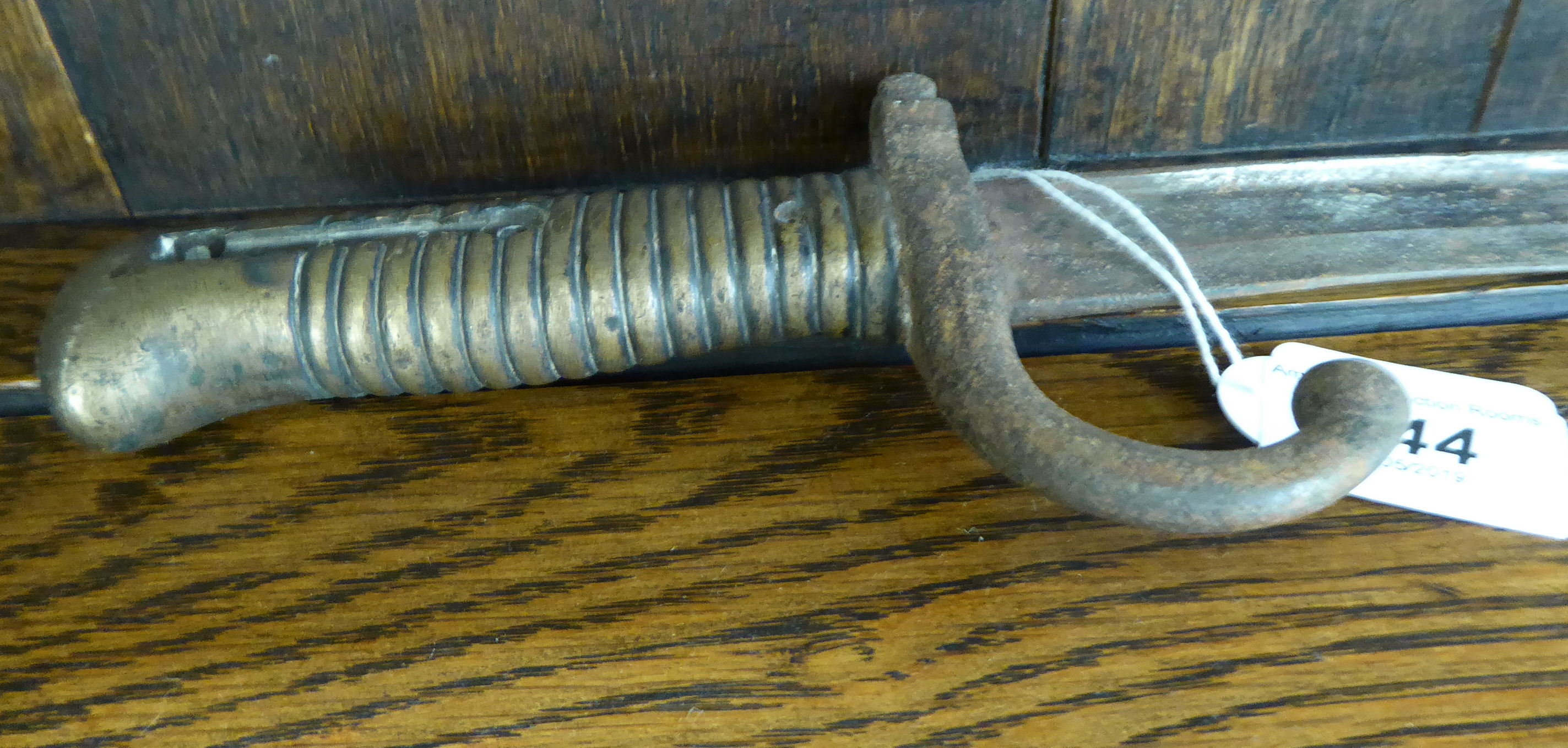 A late 19thC French bayonet with a ribbed brass handle the blade 22. - Image 2 of 2