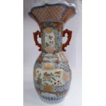 A late 19thC Japanese porcelain vase of bulbous form, the wide, straight neck having opposing,