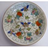 A late 19thC Chinese porcelain dish, decorated with fruit,