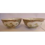 A pair of late 19thC Chinese porcelain bowls, decorated with panels of mixed foliate,