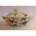 A late 19th/early 20thC Chinese porcelain bowl and cover, decorated with fruit,