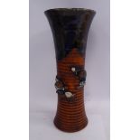 A late 19th/early 20thC Japanese moulded and part drip glazed,