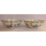 A pair of late 19thC Chinese porcelain bowls, decorated with fruit,