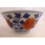 An 18thC Chinese porcelain bowl, decorated with fruiting vines bears a seal 4.