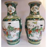 A pair of mid 20thC Chinese porcelain vases of baluster form, each with a waisted neck,