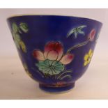 A Chinese Republic porcelain tea bowl, decorated with flowers,