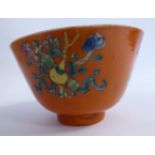 A late 19thC Chinese porcelain footed bowl, decorated with flora and domestic objects,