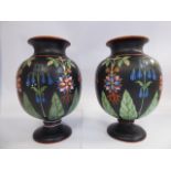 A pair of mid 19thC earthenware pedestal vases of ovoid form,