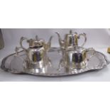 A Peruvian JPC four piece silver coloured metal tea set of round,