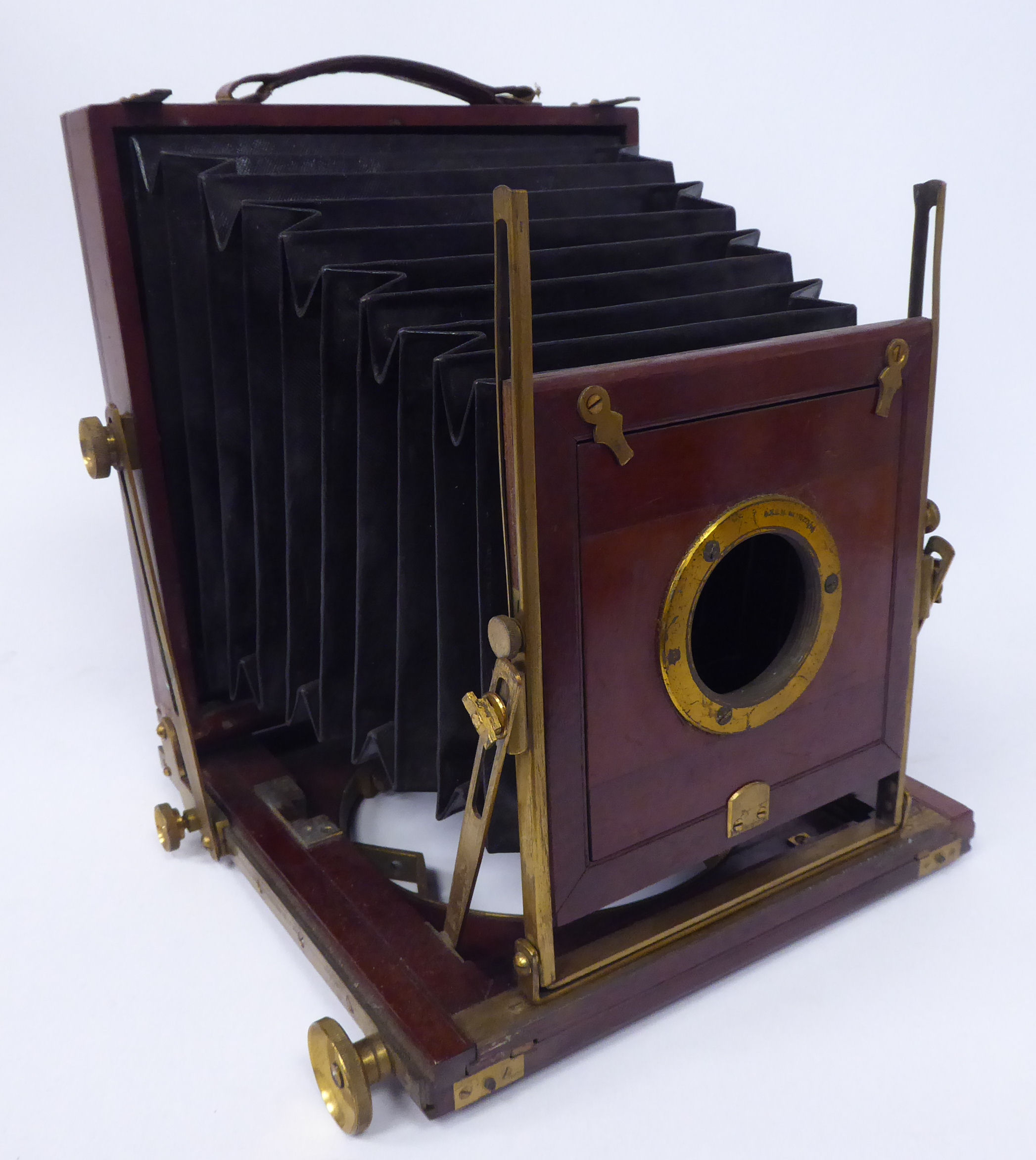 A late 19thC lacquered brass moulded mahogany plate camera with a cased Busch's Vadermecium Satz.No. - Image 2 of 12