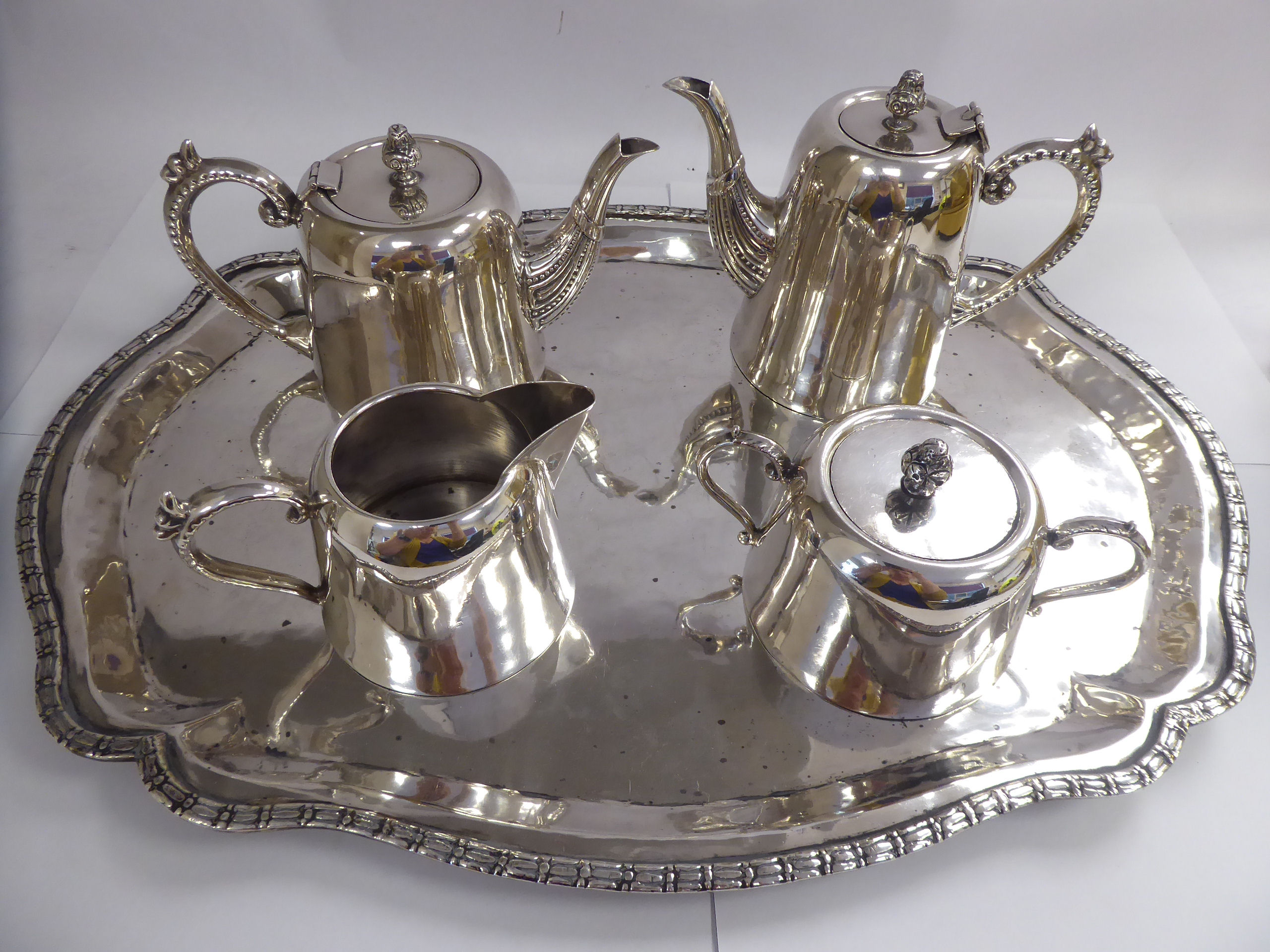 A Peruvian JPC four piece silver coloured metal tea set of round, - Image 2 of 4