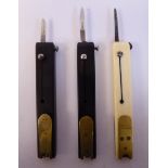 Three 'vintage' Rodgers quill cutters with brass fittings, one ivory, the others, hardwood,