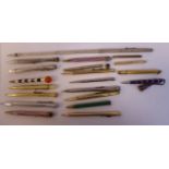 Twenty 'vintage' propelling pencils, featuring a wide variety of styles,