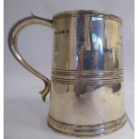 A silver one pint tankard of tapered,