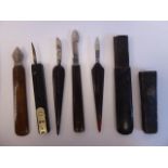 Four similar 'vintage' quill cutters: to include a Rodgers and a Reeves & Son, on hardwood handles,