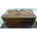 An early 19thC crossbanded satinwood and mahogany tea casket with straight sides, the domed,