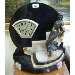 An Art Deco black and mottled marble mantle clock,