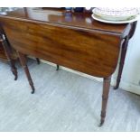A mid 19thC mahogany Pembroke table with an end drawer and facsimile on the reverse,