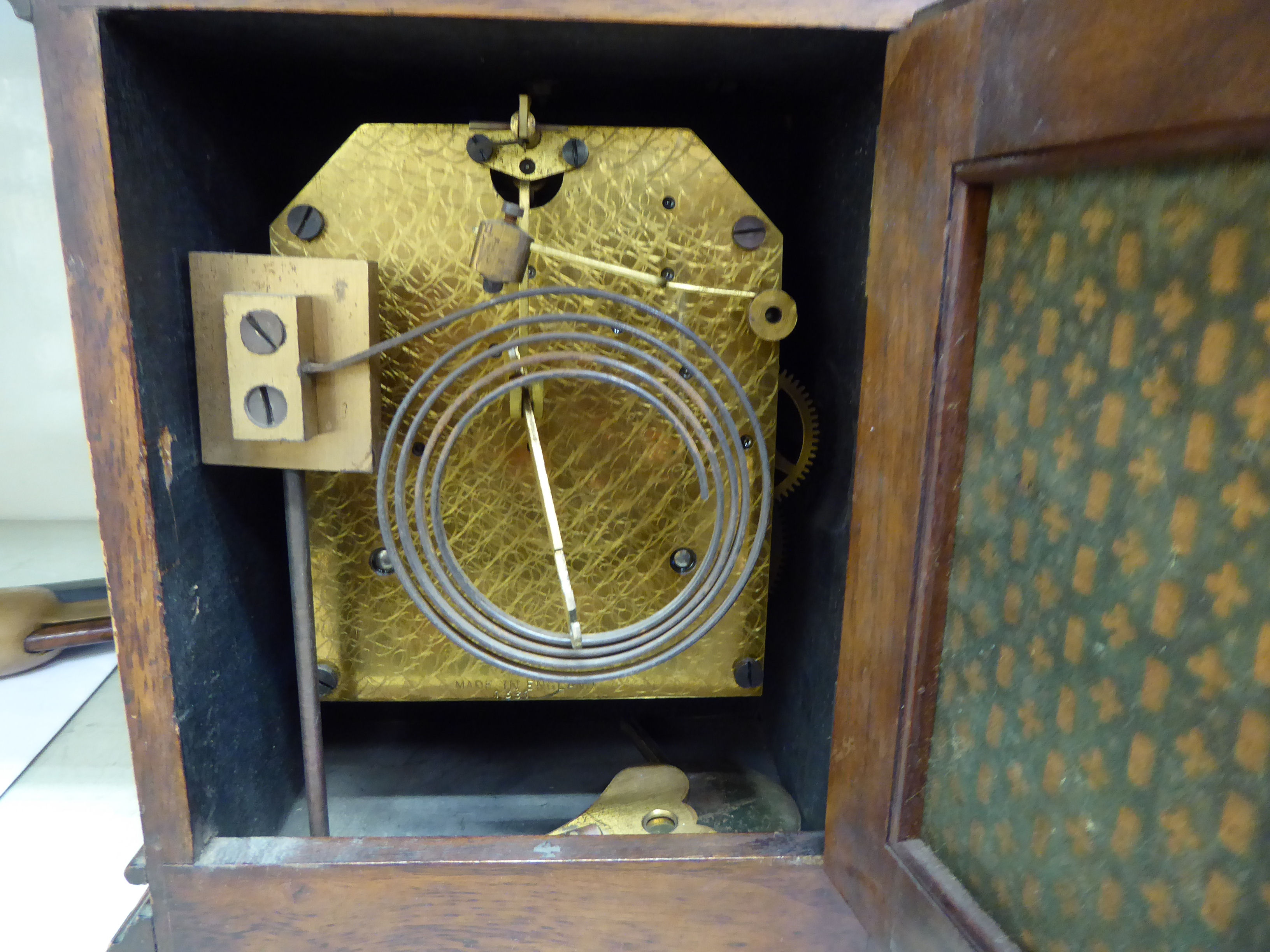 A Georgian style mahogany cased bracket clock, having a folding brass handle on the domed top, - Image 2 of 3