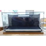 A modern retailer's partially glazed table top display cabinet 11''h 22.