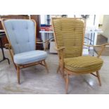 A matched pair of Ercol beech framed, high hoop and spindled wingback chairs with open arms,