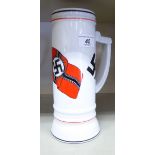 A German porcelain beer stein,