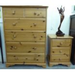 A modern waxed pine six drawer dressing chest,