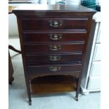 A 1920s mahogany music cabinet,