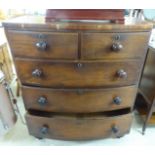 A late Victorian mahogany bow front dressing chest,