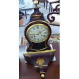 A modern reproduction of a 19thC French brown painted floral decorated and gilded,