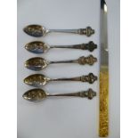 A modern Japanese letter opener, the steel blade set in a cast, gilt metal handle,