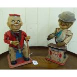 Two similar mid 20thC Japanese made tinplate and fabric, battery automaton toy figures,