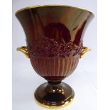 A Carlton Ware china Rouge Royale twin handled pedestal vase with floral and demi-reed moulded