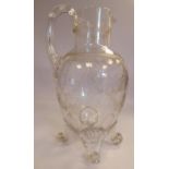 An early Victorian clear glass ovoid shaped jug, having a wide,